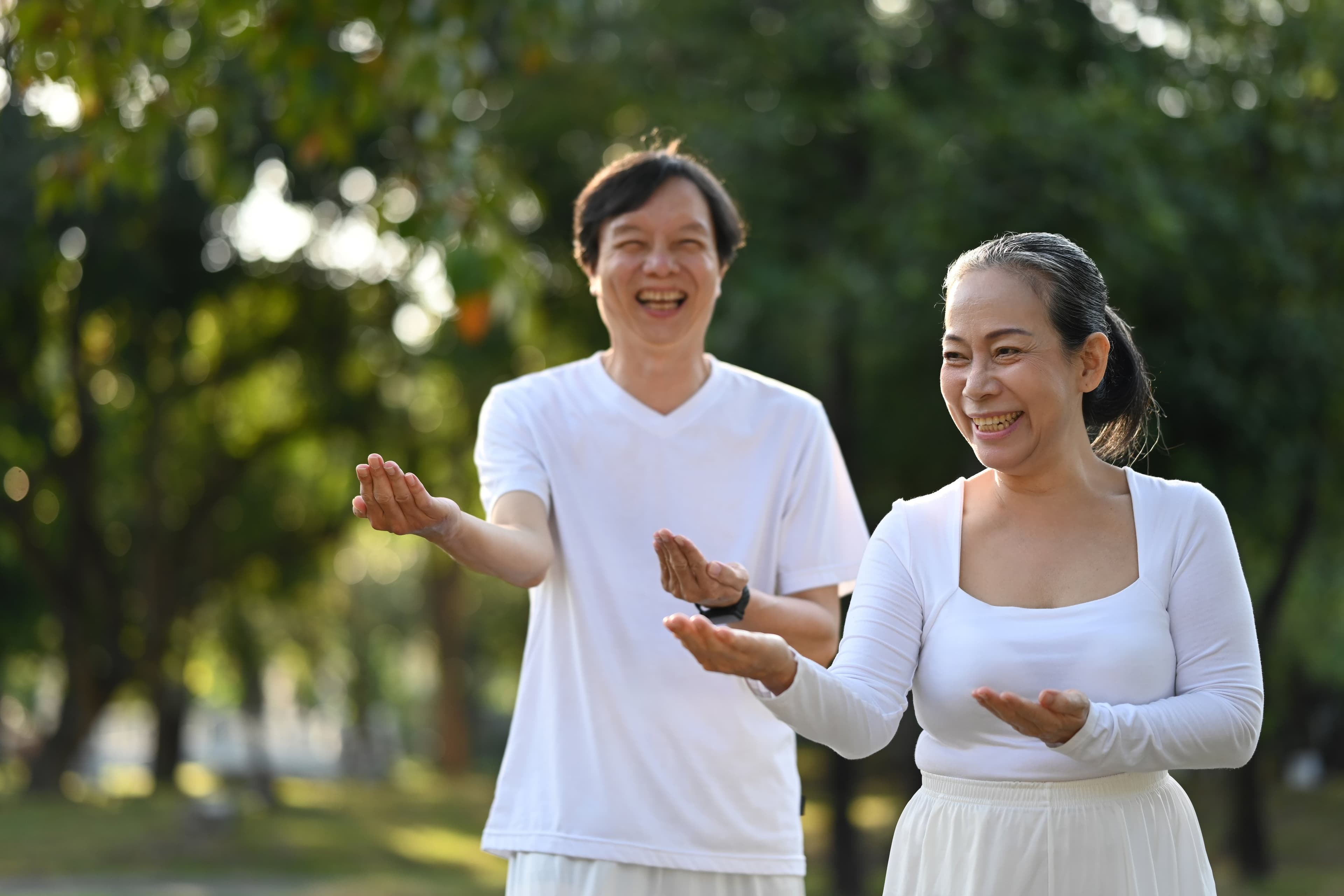 Couple in white in park
